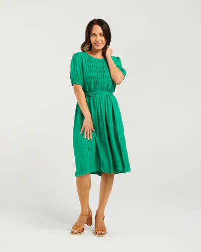 Model wearing Green Joana Dress By Seduce Available at Beetees Nelson